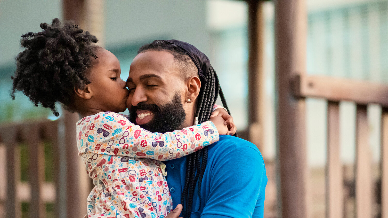 Father and child sharing a joyful moment together.